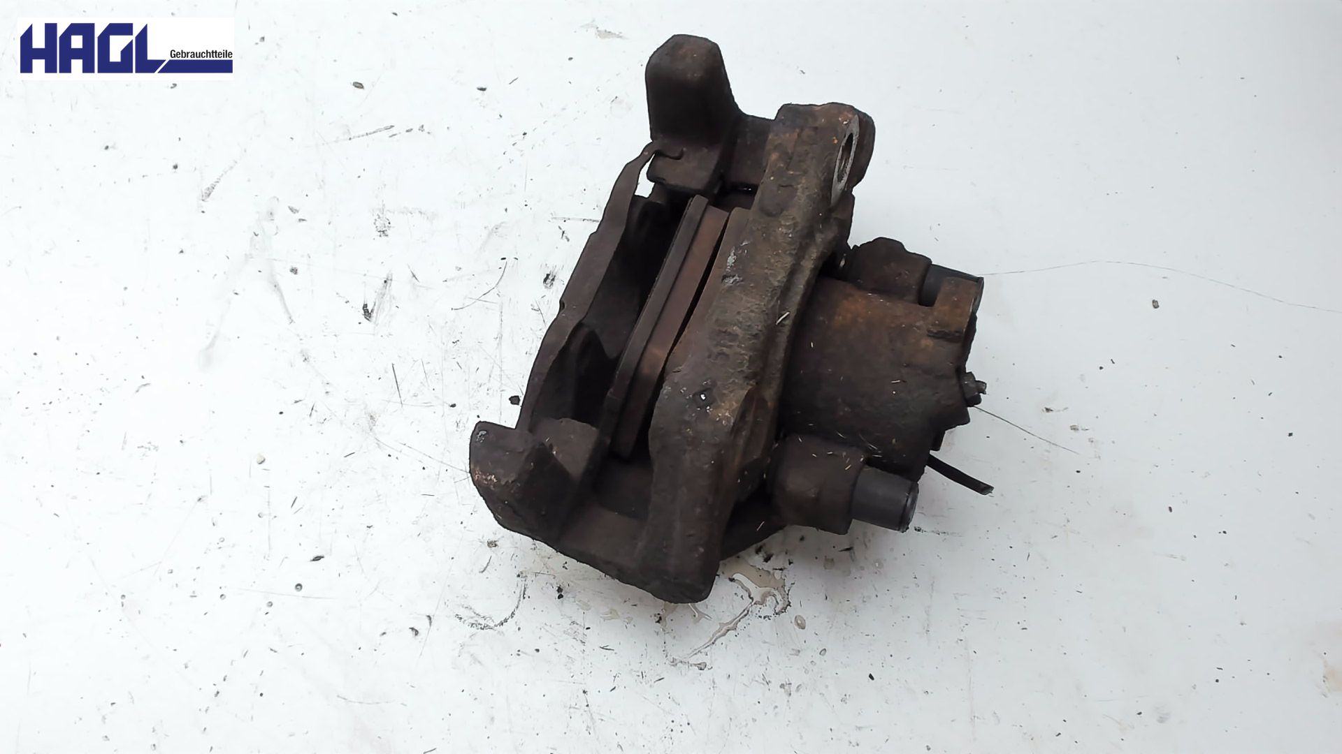 BREMSSATTEL M TRÄGER LINKS VORNE