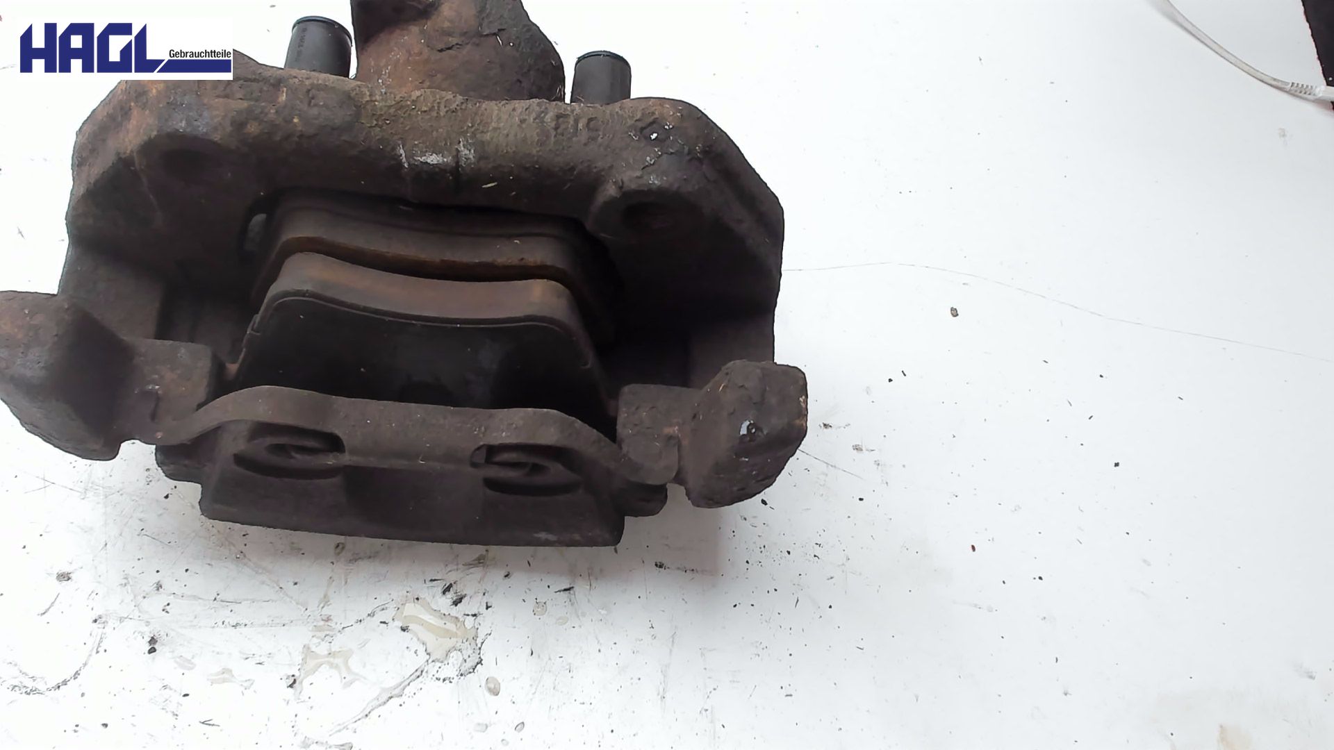 BREMSSATTEL M TRÄGER LINKS VORNE