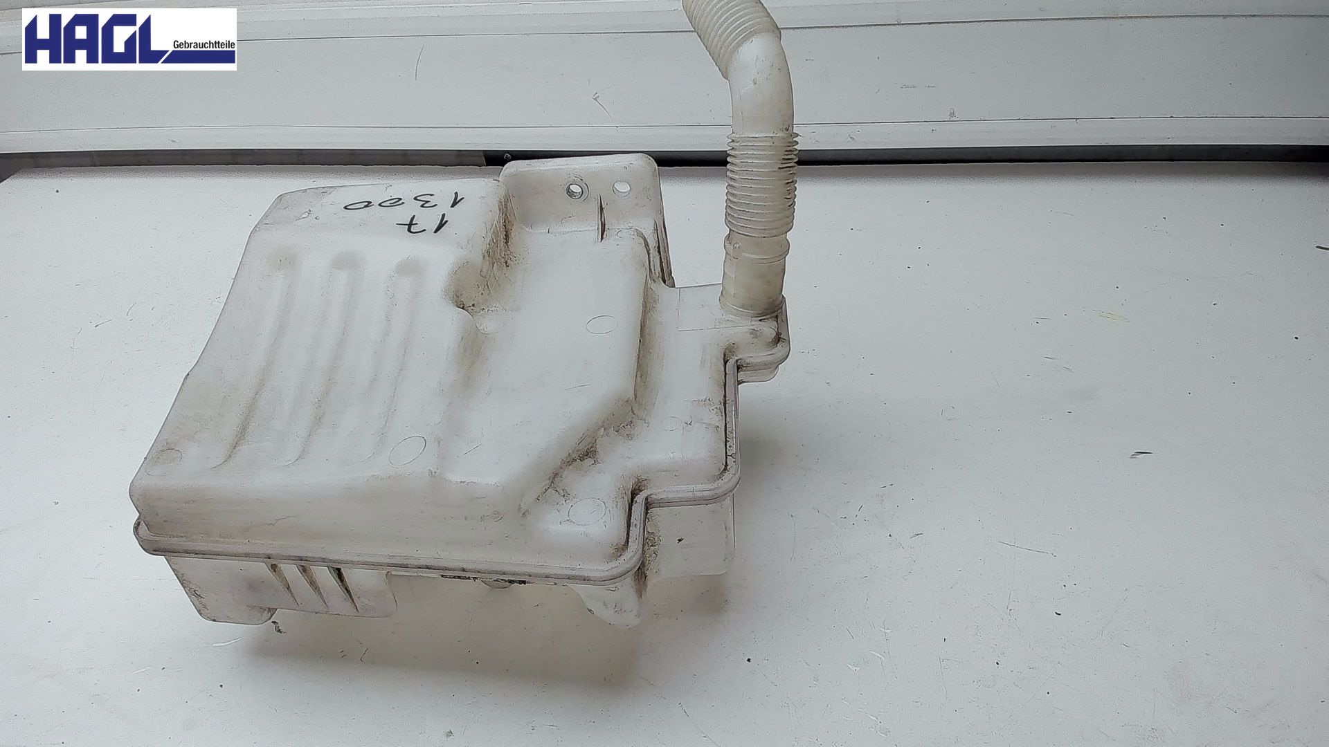 Conteneur de lave-glace