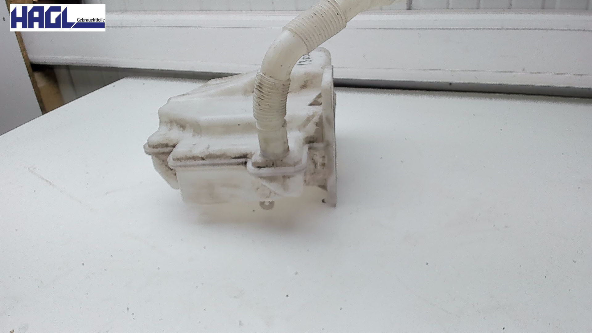 Conteneur de lave-glace