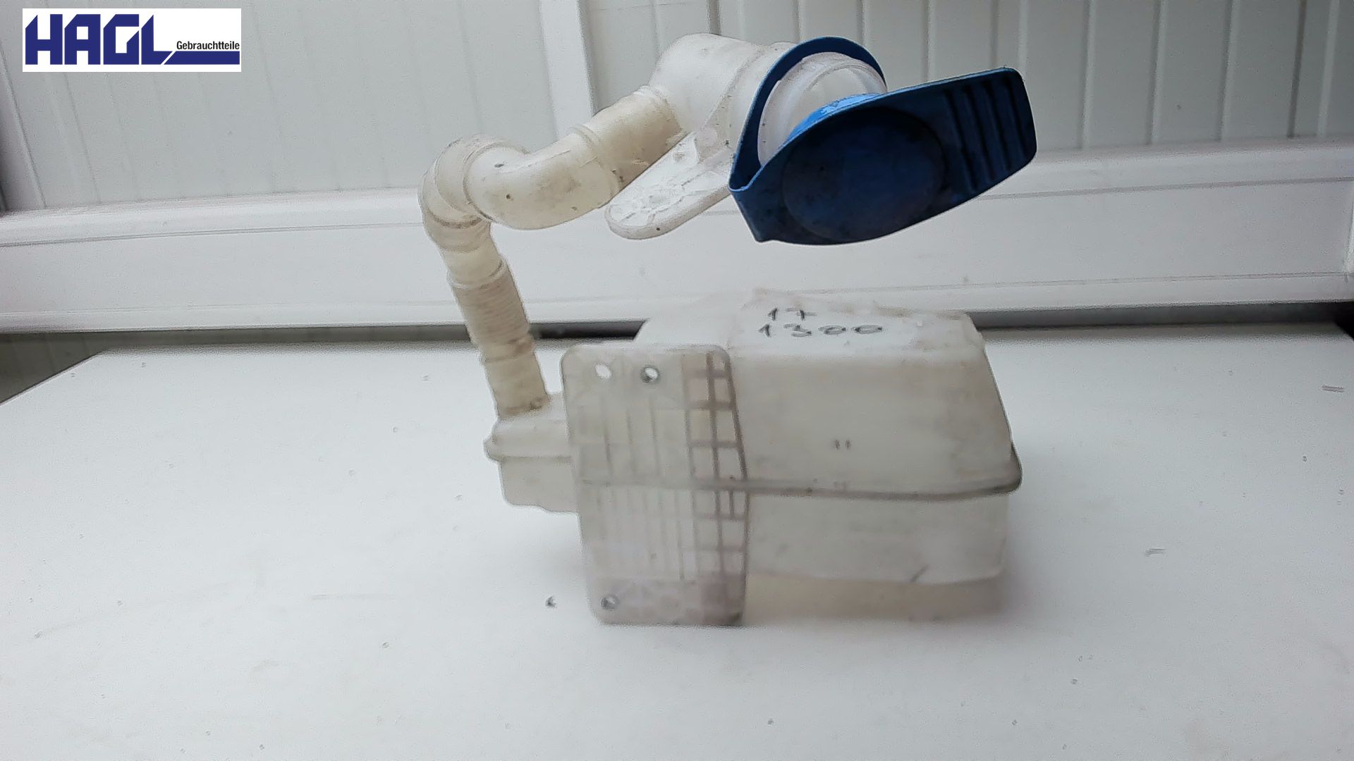 Conteneur de lave-glace