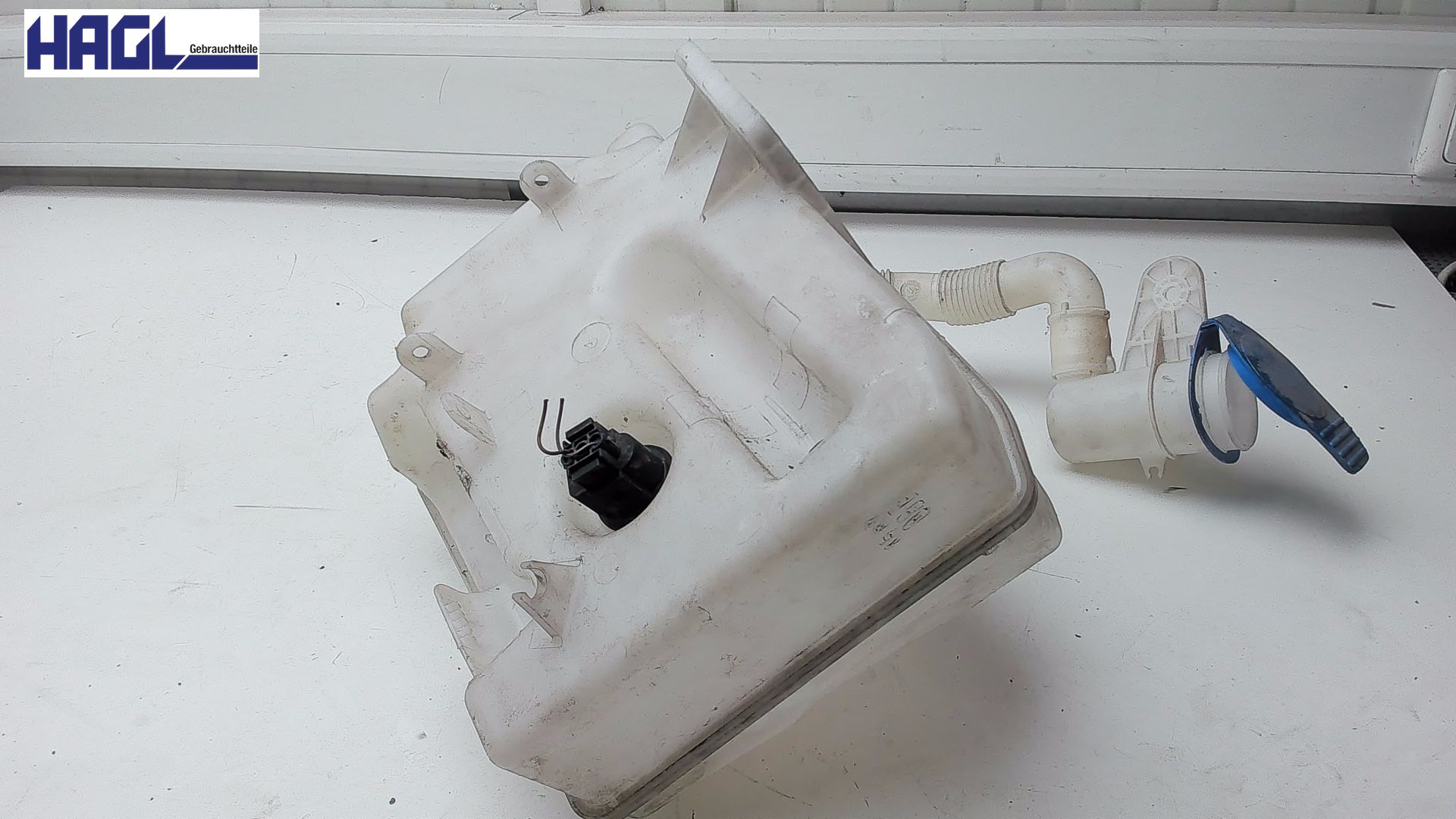 Conteneur de lave-glace