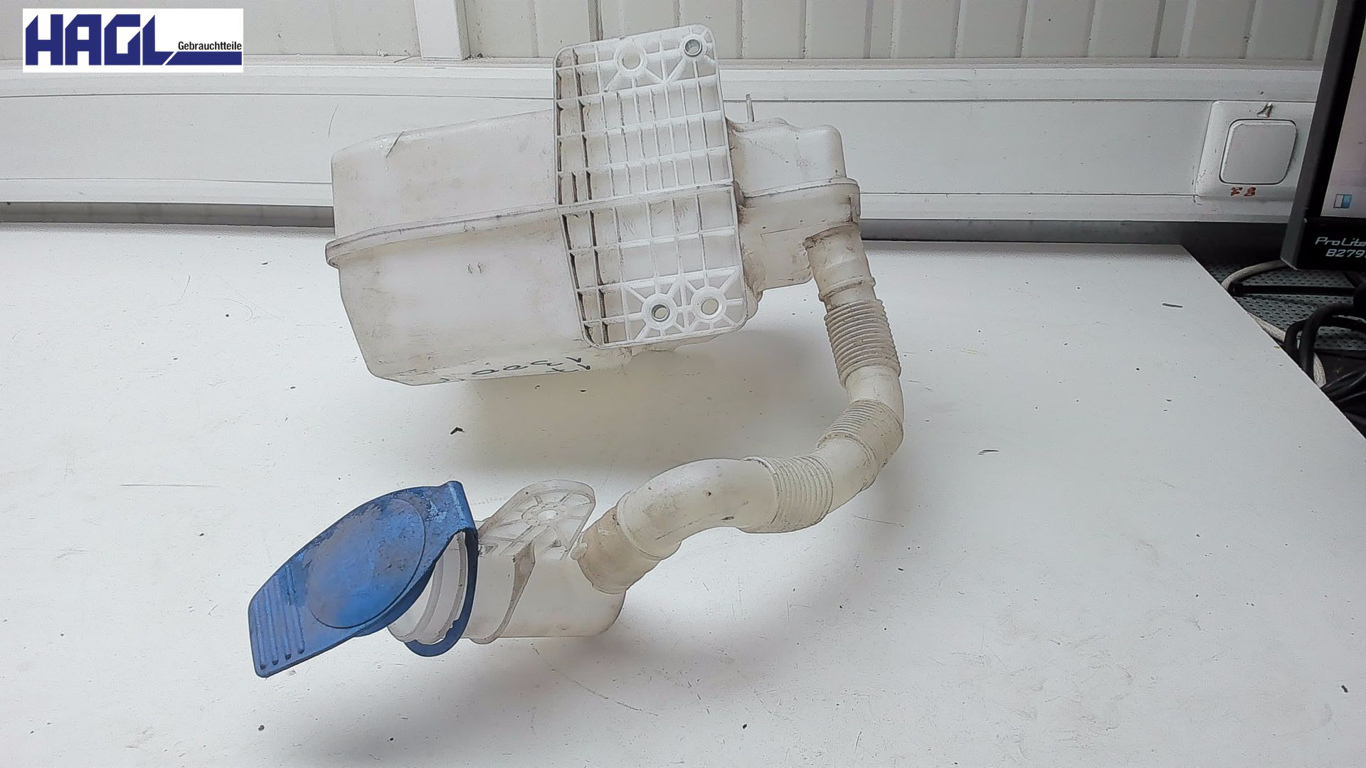 Conteneur de lave-glace