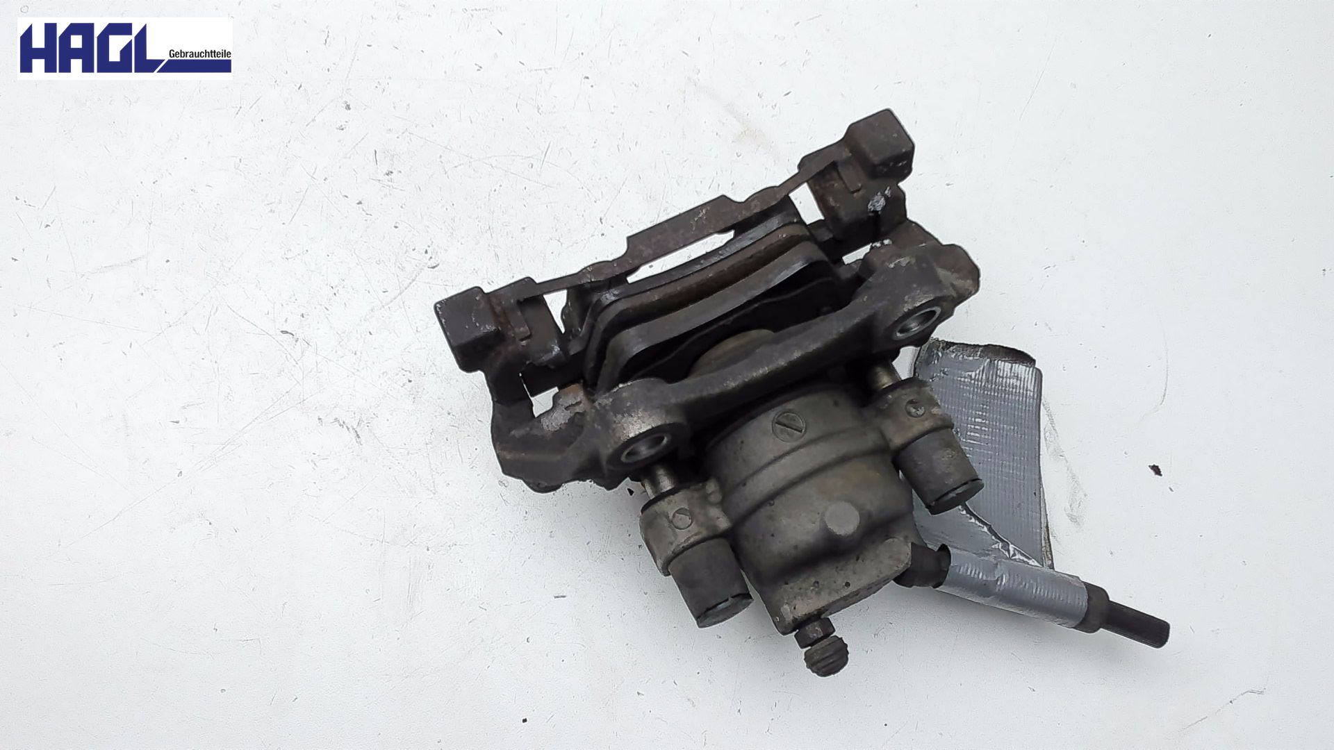BREMSSATTEL HINTEN LINKS