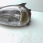Opel Corsa Corsa B Scheinwerfer LINKS Limousine